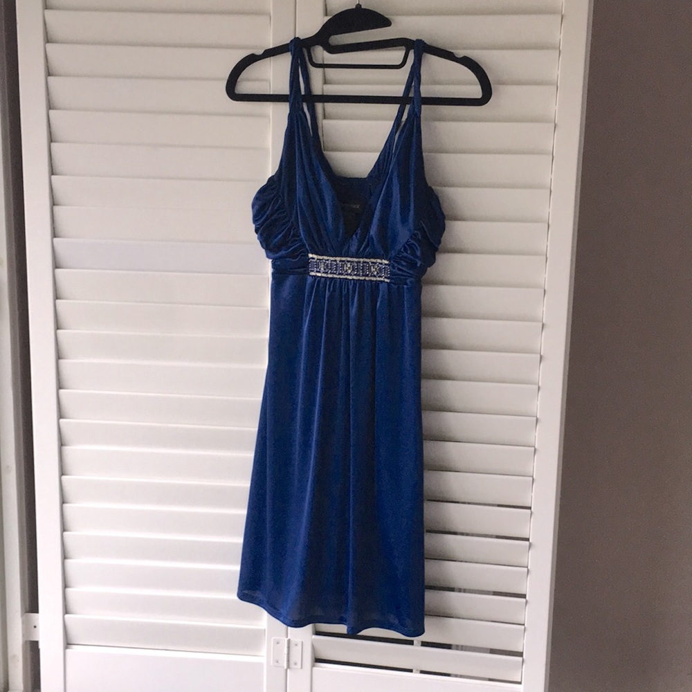 Royal blue knee-length formal dress with detailed beading on bust.